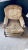 This is a wonderful French very comfortable deep chair with wooden legs. It does need reupholstering. It does have a very...