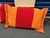 These Marimekko‑inspired pillow shams feature bold vertical striping in saturated red and orange, creating a clean, modern...