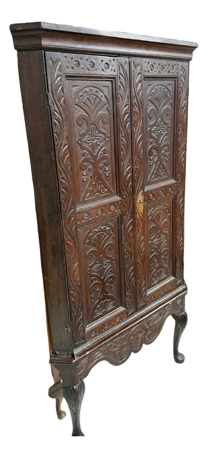 Antique Oak 2 Door Corner Unit With Carved Panels Resting On Cabriole Feet