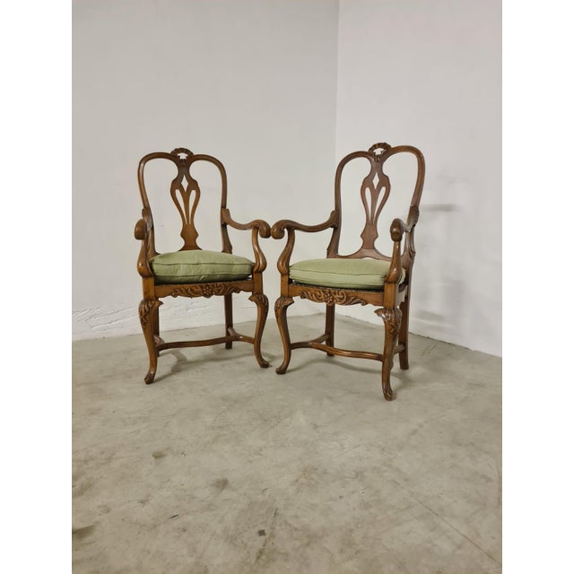 Pair of walnut high chairs. Two 18th century baroque style high chairs. Walnut wood structure and straw seat. Cushions...