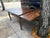 1900s oak drawer leaf table, some discolor to top , nice carved freeze. 106 inches fully extended.