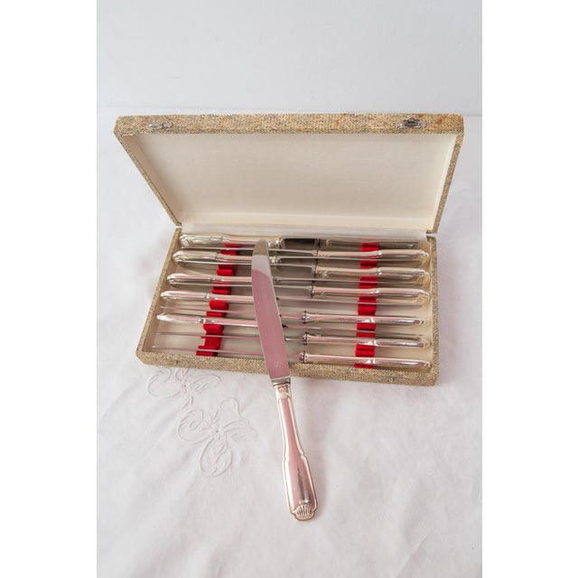 Handles with silver-plated metal. Stainless steel slats.