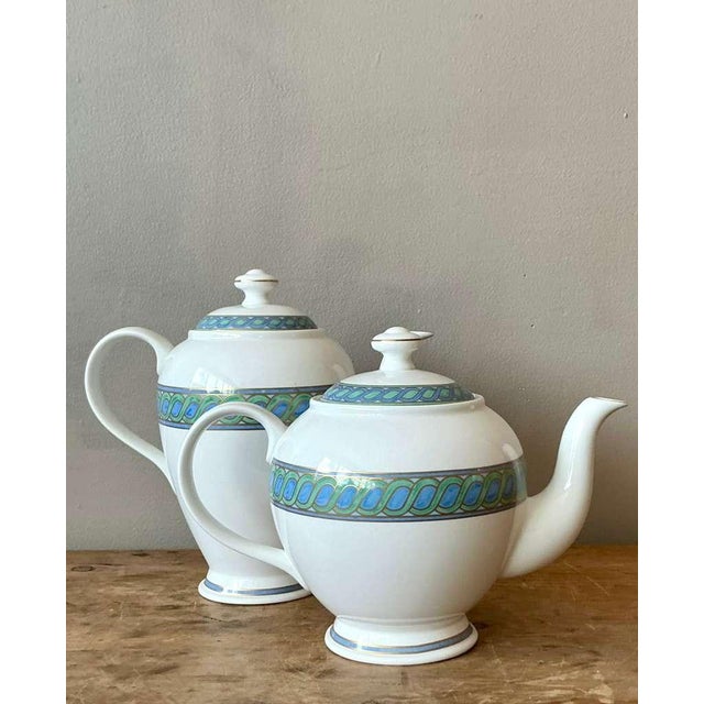 Bring timeless sophistication to your table with this vintage Christofle “Torsada” coffee and teapot set, a stunning pair...