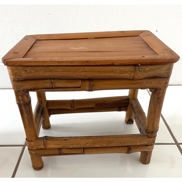 Vintage rectangular shaped bamboo rattan plant stand, table riser. flat bamboo top.