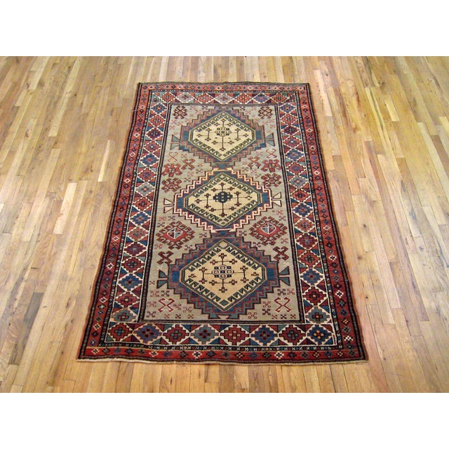 Antique Caucasian Kazak Oriental Carpet, Small size, circa 1900 A one-of-a-kind antique Caucasian Kazak Oriental Carpet,...