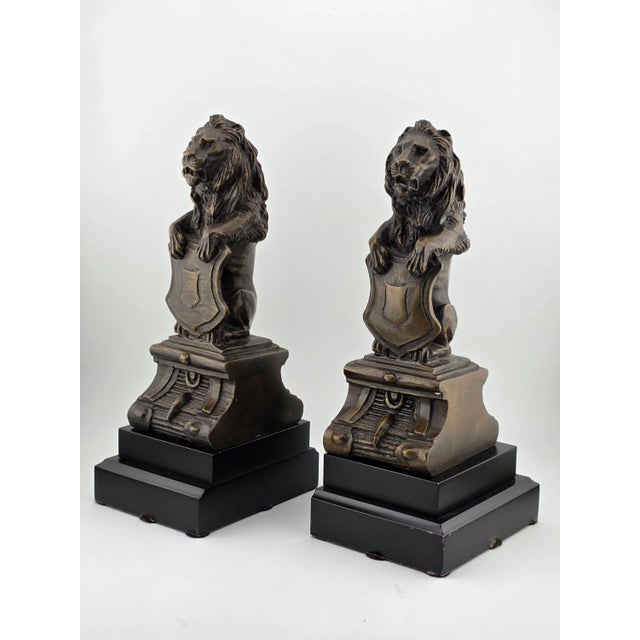This rare antique pair of Victorian-era bronze lion rampart bookends on pedestal are a unique and elegant addition to any...