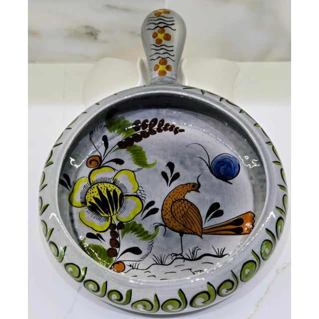 Highly decorative hand‑painted cazuela by José Noé Suro for Cerámica Suro, the influential family ceramics workshop in...