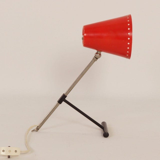 Adjustable red table or wall light designed by Floris Fiedeldij for Artimeta in ca. 1956; very beautiful due to its...