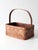 Vintage woven splint basket showcasing the beauty and simplicity of traditional handmade folk craft. The petite basket...