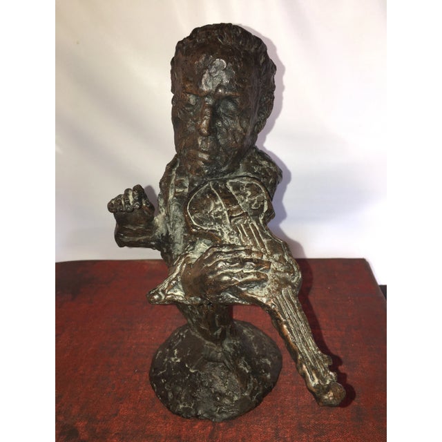 1950s brutalist sculpture of a violinist The metal retains the clay strokes used to create the sculpture Superb casting...