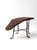 This antique Victorian shoe fitting stool features a twisted iron base, sloped upholstered top, and metal heel stop....