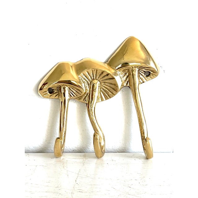 Solid brass triple mushroom wall hook. Perfect for dish towels, keys, leashes, etc.