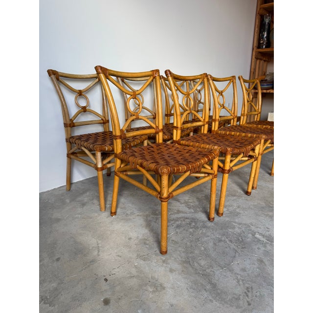 This beautiful set of eight vintage McGuire-style dining chairs embodies the relaxed elegance of Boho Chic and Coastal...