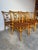 This beautiful set of eight vintage McGuire-style dining chairs embodies the relaxed elegance of Boho Chic and Coastal...