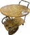 This elegant Italian drinks trolley features a folding drop-leaf top with intricate floral marquetry, scrolling inlay,...