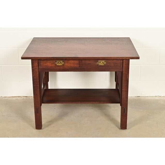 An exceptional antique Mission or Arts & Crafts writing desk or library table By Gustav Stickley USA, Circa 1910 Quarter...