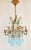 Vintage Mid-Century Italian gilt metal chandelier with light blue French opaline crystals. The small pendant chandelier...
