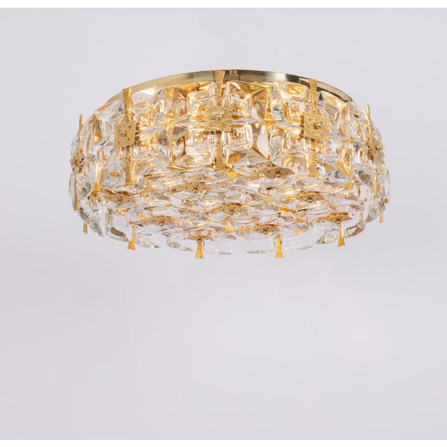 Delicate floral chandelier with crystal glass and brass parts made by palwa, germany, 1970s. Featuring a multitude of...