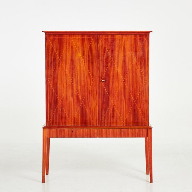Beautiful vintage cabinet in Swedish Grace style in excellent condition. This piece is designed in the style of the...