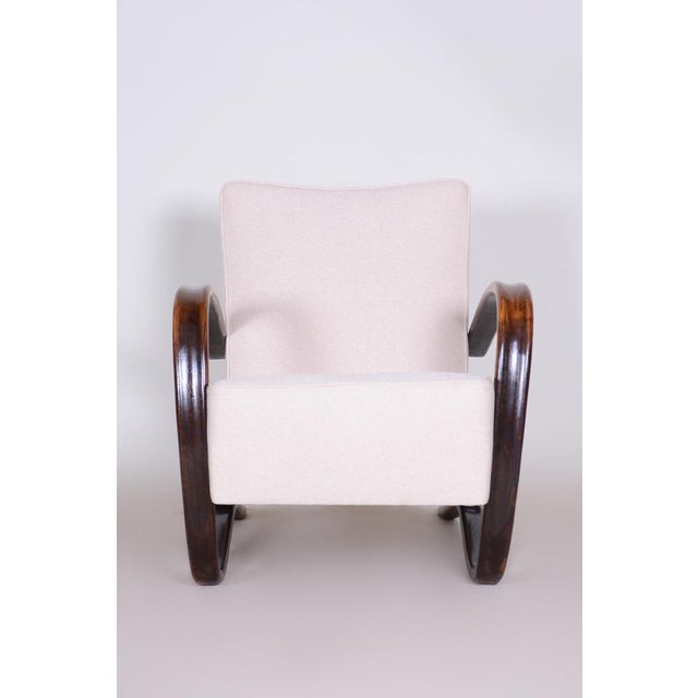 Art Deco armchair. United Arts & Crafts manufacture. Designed by Jindrich Halabala. Completely restored, surface made by...