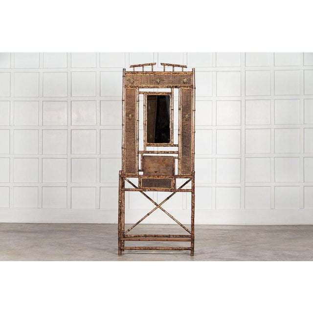 Circa 1870 19th century English Bamboo mirrored hall stand. Measures: W75 x D30 x H195 cm.