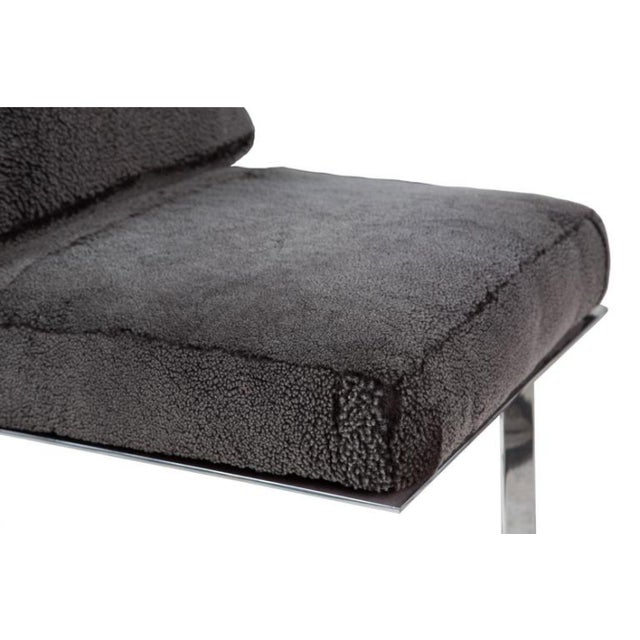 The Yves lounge chair from the Modern Envy collection exclusively by On Madison. Chair of rolled and mirrored aluminum...