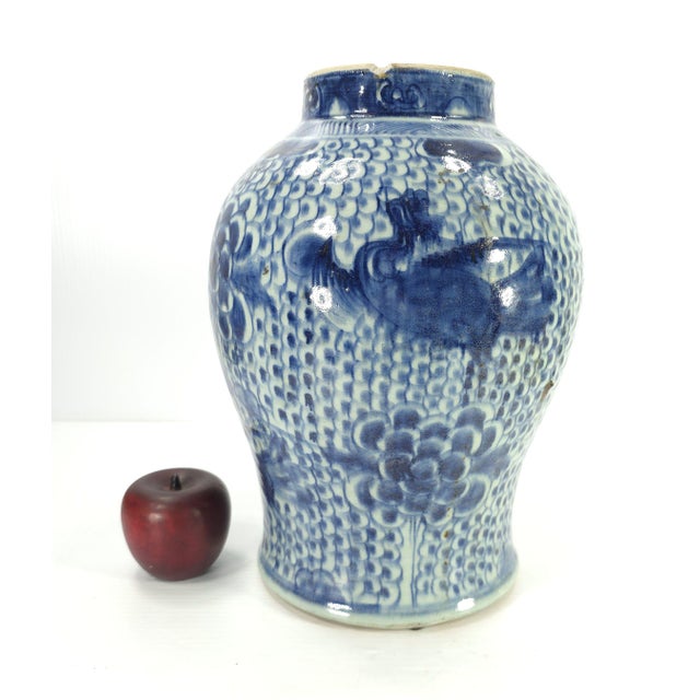 Large and stunning Chinese vase with a large bird, perhaps a phoenix, decorating this piece.