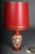 Old Asian porcelain table lamp, red with shade, electrified Beautiful old Asian table lamp, red background with gold...