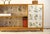 A charming piece of Swedish Modern / Swedish Grace bookcase from the 1940s, crafted in warm birch and lined with botanical...