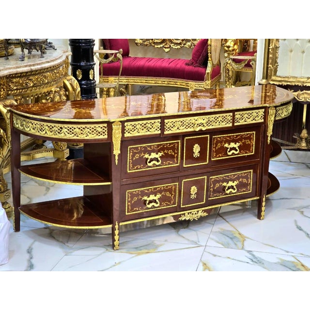 Featuring a distinctive semicircular top and gracefully curved side shelves, this refined piece blends the hallmark...