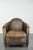 This rugged cowhide leather armchair in an aviator design is full of character and features a unique aluminum finish. The...
