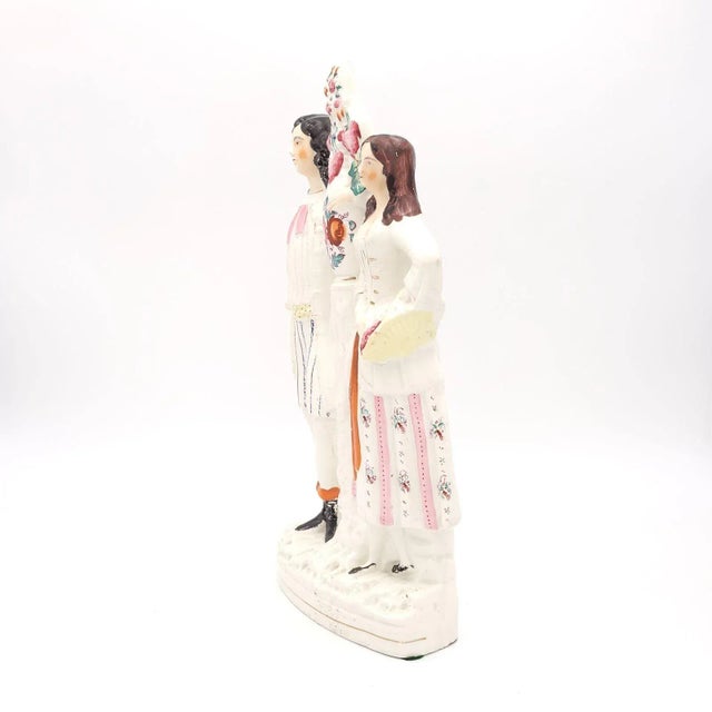 A young couple, English Staffordshire, circa 1870.