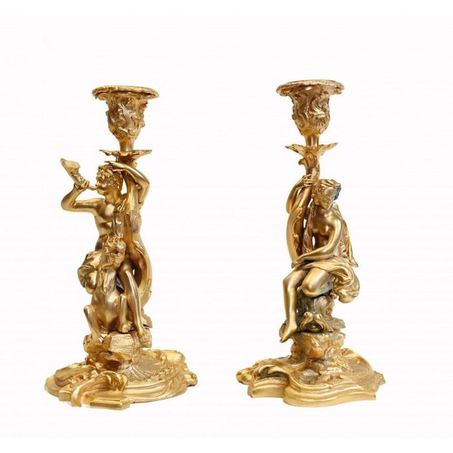 You are viewing a pair of classical French candlesticks in ormolu The subjects - a male with horn on horseback and a...