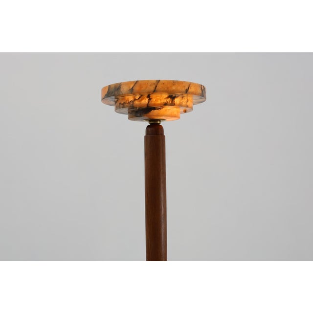 France / 1925 / floorlamp / oak, messing and alabaster / Art Deco An elegant French Art Deco floor lamp from around 1925,...