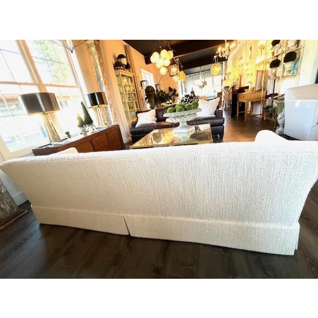 Beautifully restored Mid-Century Modern Sofa upholstered in a high performance boucle, Moero in Ecru by Casamance. Fine...