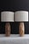 Pair of Westwood studios style .lamps. Hand carved rubbed finish embellished by carved waves giving pieces more depth....