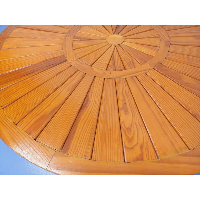 Vintage round coffee table from the 1970s, pine wood slatted frame, base, and top, octagonal legs, very good overall...