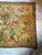 Incredible earth tone tapestry of a hunting scene. Features two men, dogs and foliage in an array of salmons, terracotta,...