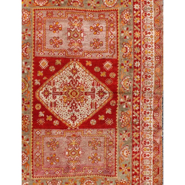 Antique Turkish Oushak Rug With Colorful Flowing Floral and Geometric Motifs in red, green, pink, Keivan Woven Arts/...