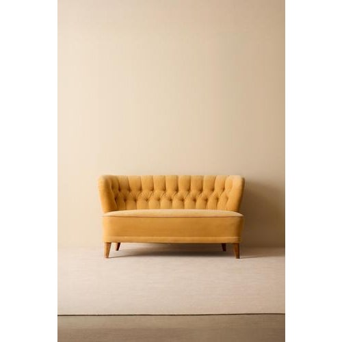 Swedish Modern sofa in yellow fabric. Good condition, small signs of usage. Sold in Sweden through the retailer Gösta...