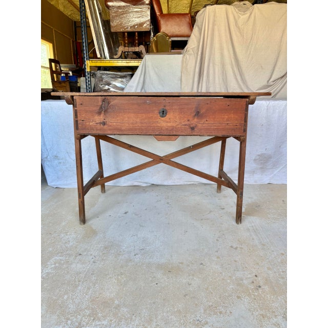 Found in Spain, this 19th Century One Drawer Side Table was crafted from old growth pine and dates back to the late...
