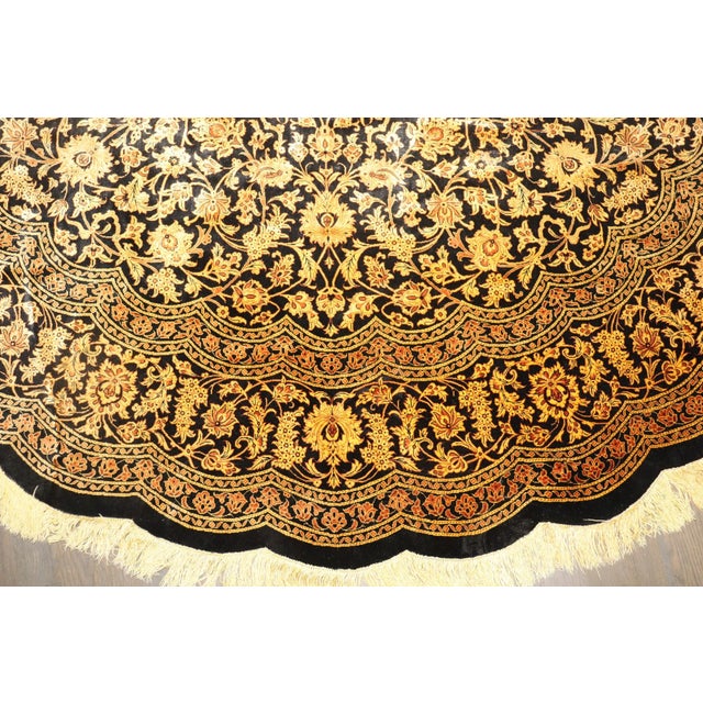 a mid 20th Century all Silk round rug Signed by Zanjan