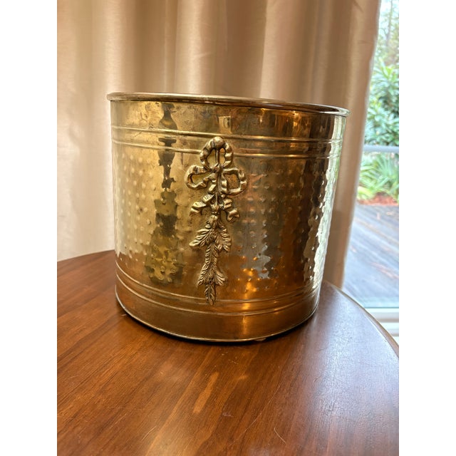 Elevate your interior styling with this vintage hammered brass Cachepot Planter, featuring a richly textured surface and...