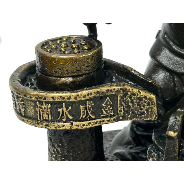 Vintage Bronze Color Metal Old Style Dressing Kid Grinding Pose Statue For Sale - Image 10 of 13