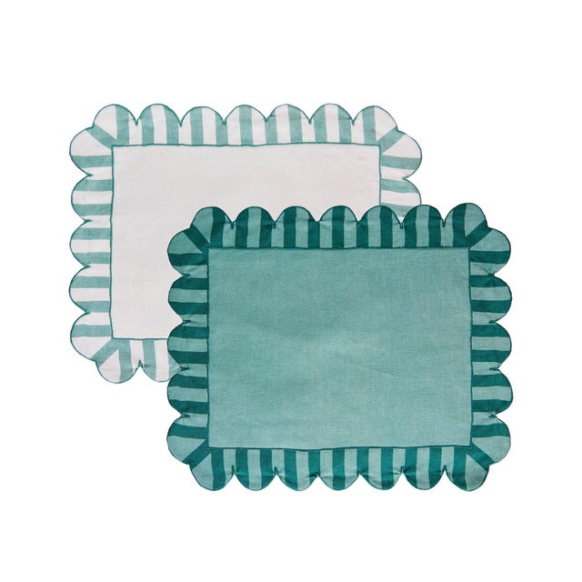 Even the most casual of dinners will feel fun and playful when framed by our candy-striped scalloped placemats. Try mixing...