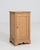 A 19th century French side table in the Louis Philippe style, featuring a compact cabinet form with a single door and...
