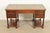 A gorgeous French Empire or Neoclassical style desk By Hekman Furniture USA, Circa 1960s Beautiful burled walnut, with...