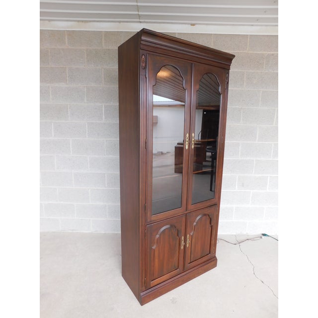 Ethan Allen Georgian Court Cherry Display Lighted Wall Cabinet 119210 Description: Features quality crafted solid...