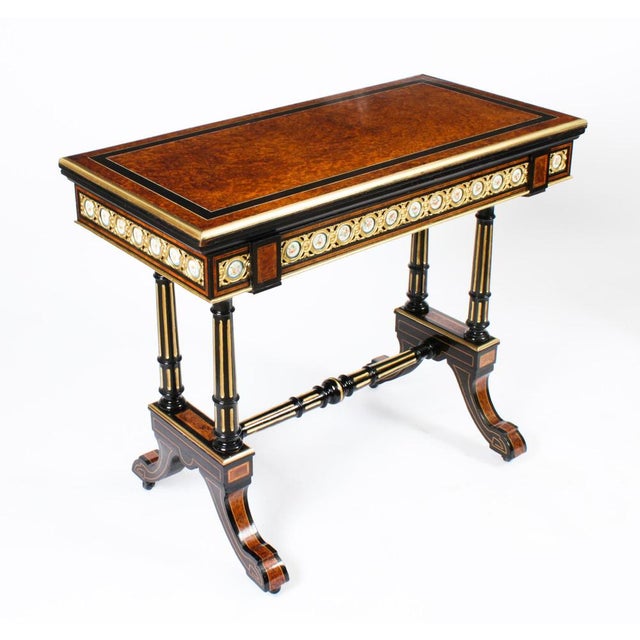 This is a stunning pair of antique French amboyna and ebonised card tables, circa 1860 in date. The tables are made from...