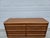 This classic walnut double chest of drawers or dresser is designed by T.H. Robsjohn-Gibbings for Widdicomb out of Grand...